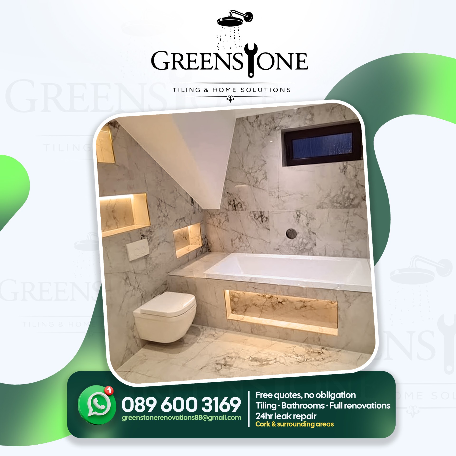 Marble-effect tiled bathroom in Cork by Greenstone with backlit niches